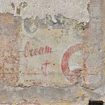 The advertisement for Streets Ice Cream was temporarily laid bare when the side of the former corner shop at 105 Hereford Street, Forest Lodge, was stripped of paint.