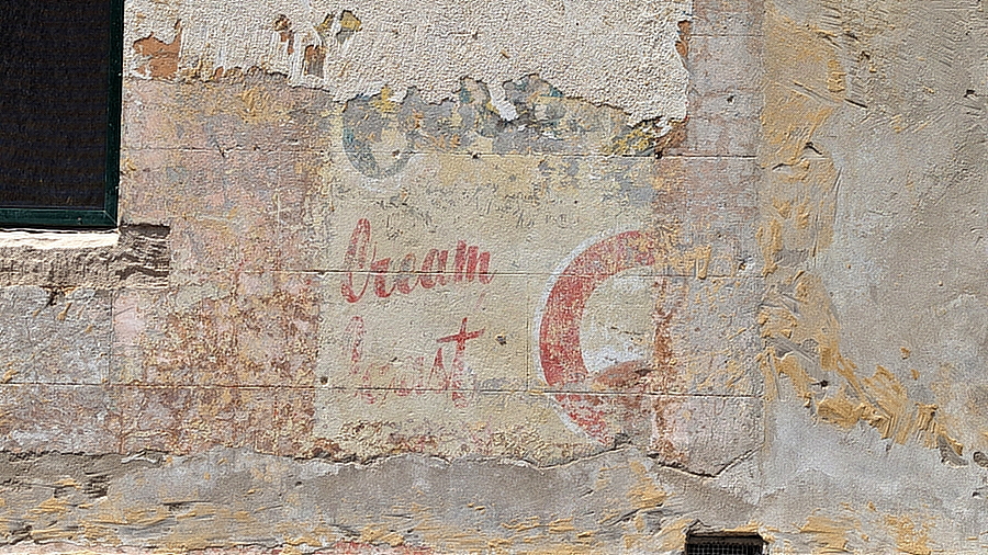 



The advertisement for Streets Ice Cream was temporarily laid bare when the side of the former corner shop at 105 Hereford Street, Forest Lodge, was stripped of paint.